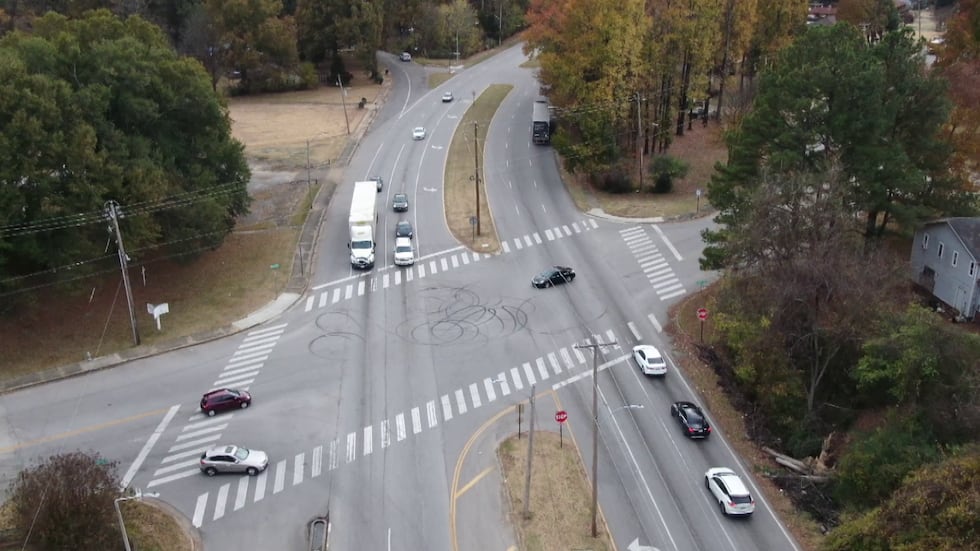 Evidence of cars doing burnouts at the intersection of New Allen Road and Scenic Highway