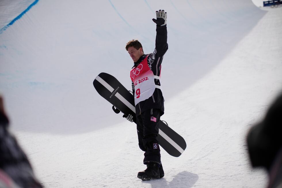 United States' Shaun White waves in the halfpipe course after the men's halfpipe finals at the...