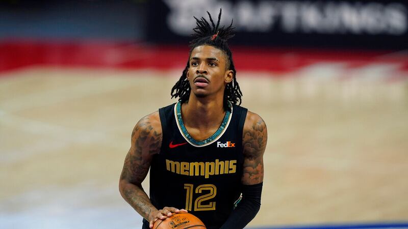 Memphis Grizzlies guard Ja Morant plays during the second half of an NBA basketball game,...