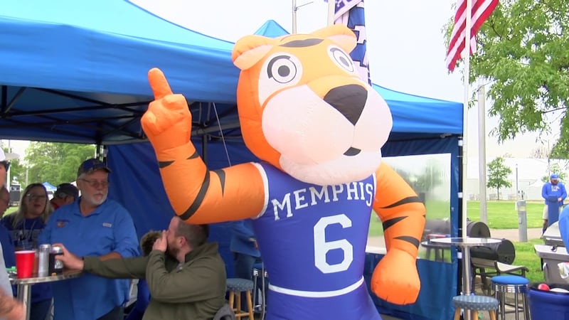 Fans tailgating before a game in April 2021.