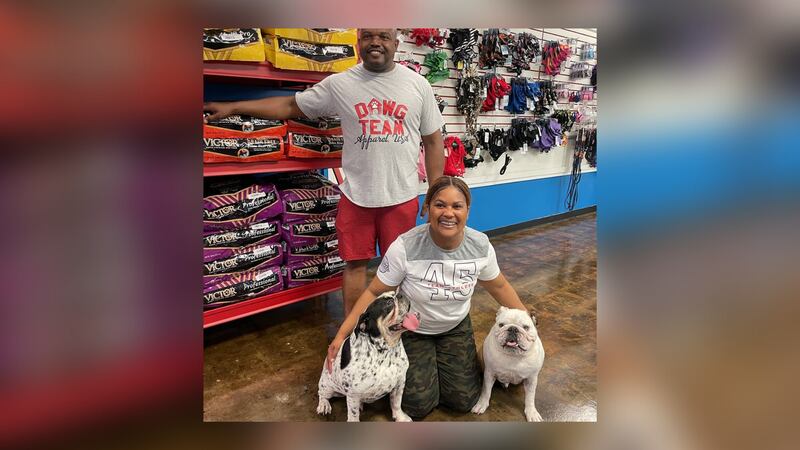 Owners, Audrey and Calvin Morrow inside of their new dog apparel store