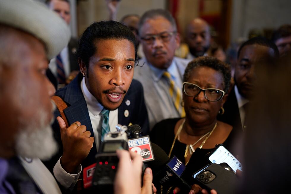 Rep. Justin Jones, D-Nashville, speaks to reporters outside the House chamber after being...