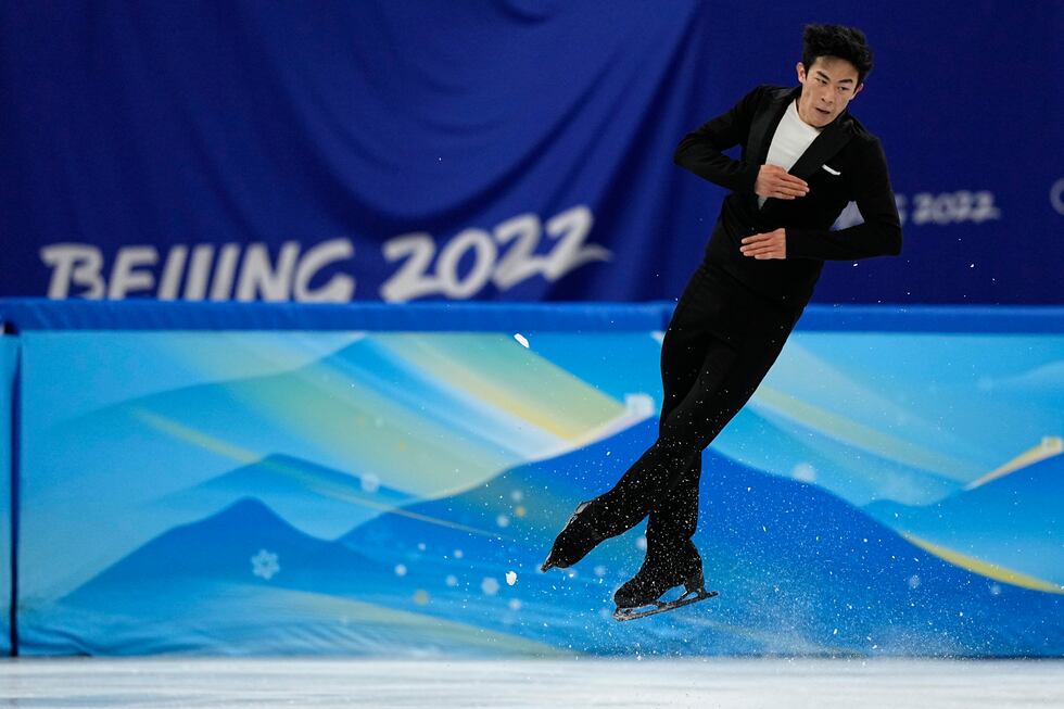 Nathan Chen, of the United States, competes during the men's short program figure skating...