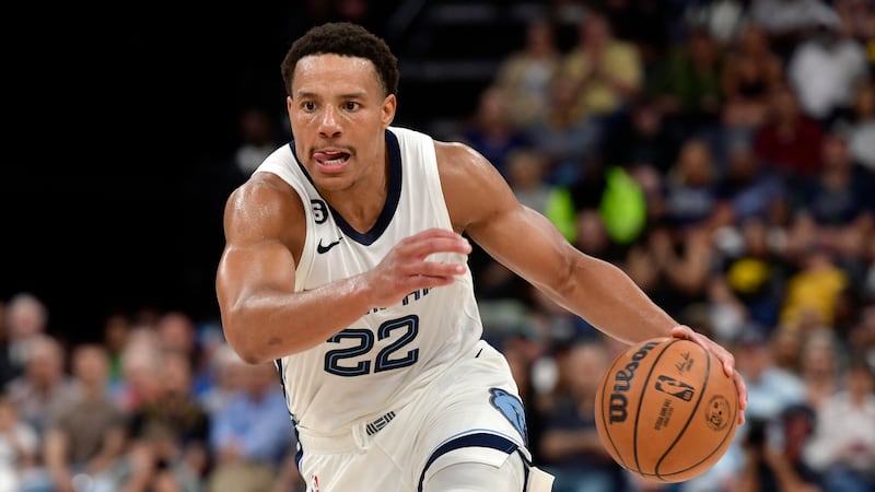 Memphis Grizzlies guard Desmond Bane (22) handles the ball in the second half of an NBA...